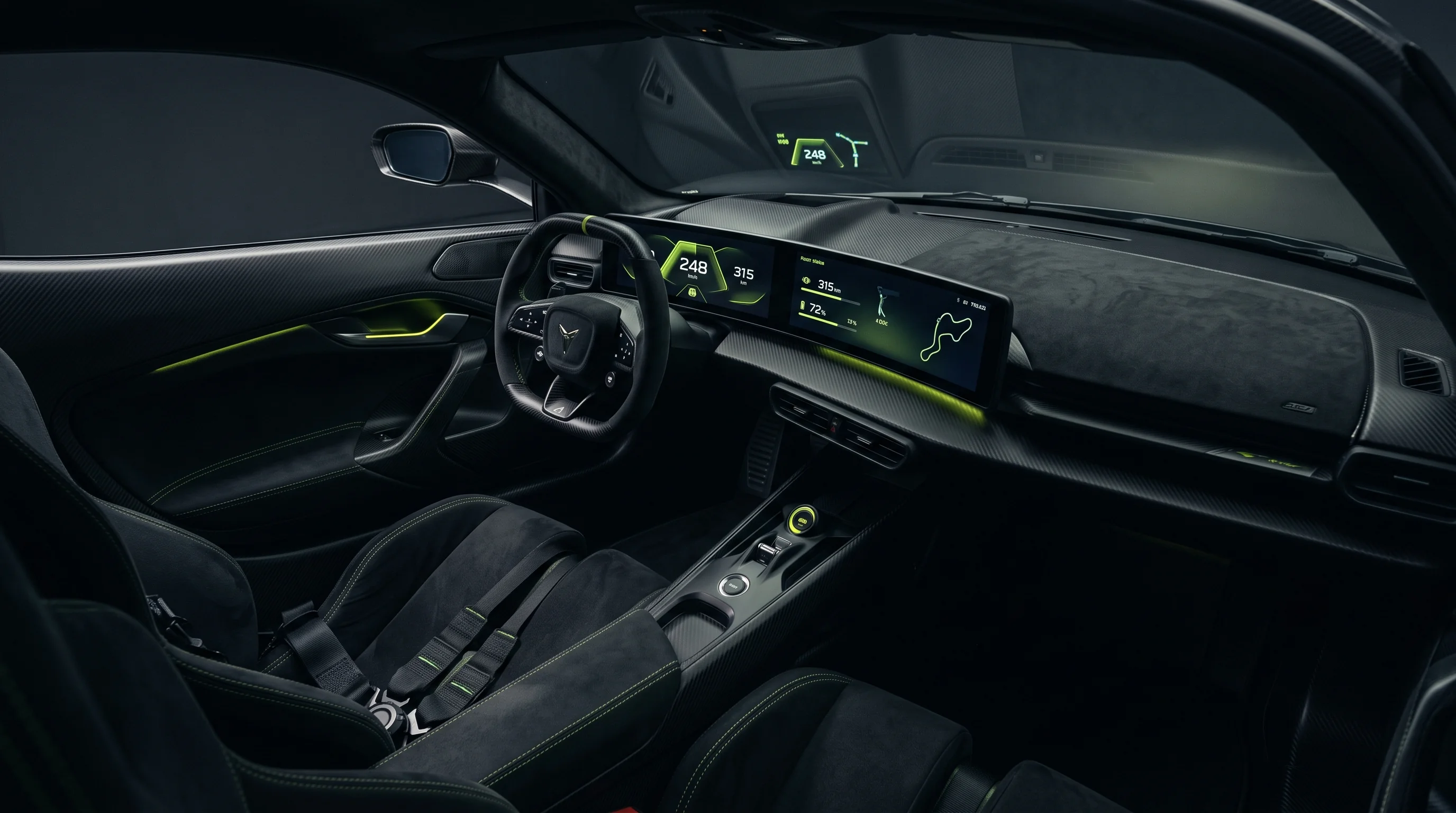 Cockpit do VOLT UM com iluminação verde e volante de competição